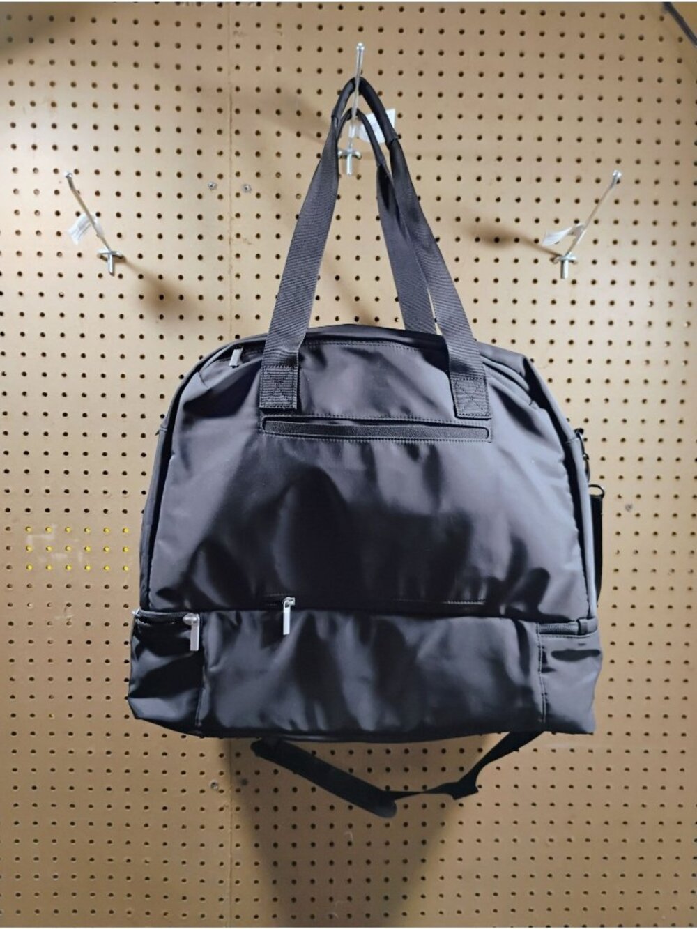 Open Story. Expandable Black Nylon Travel Duffel Bag With Multiple Compartments